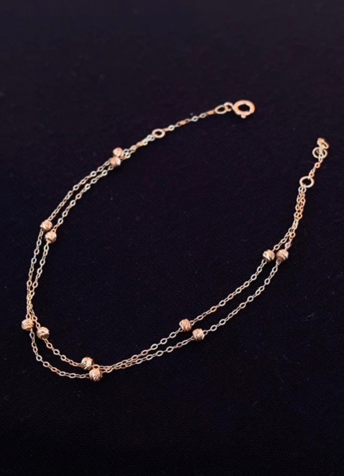 Gourmette Double Boules  en or 18 carats