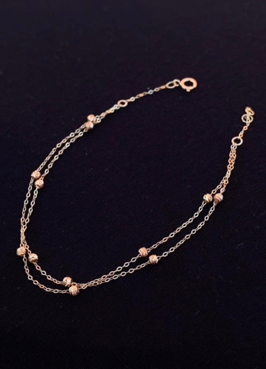 Gourmette Double Boules  en or 18 carats