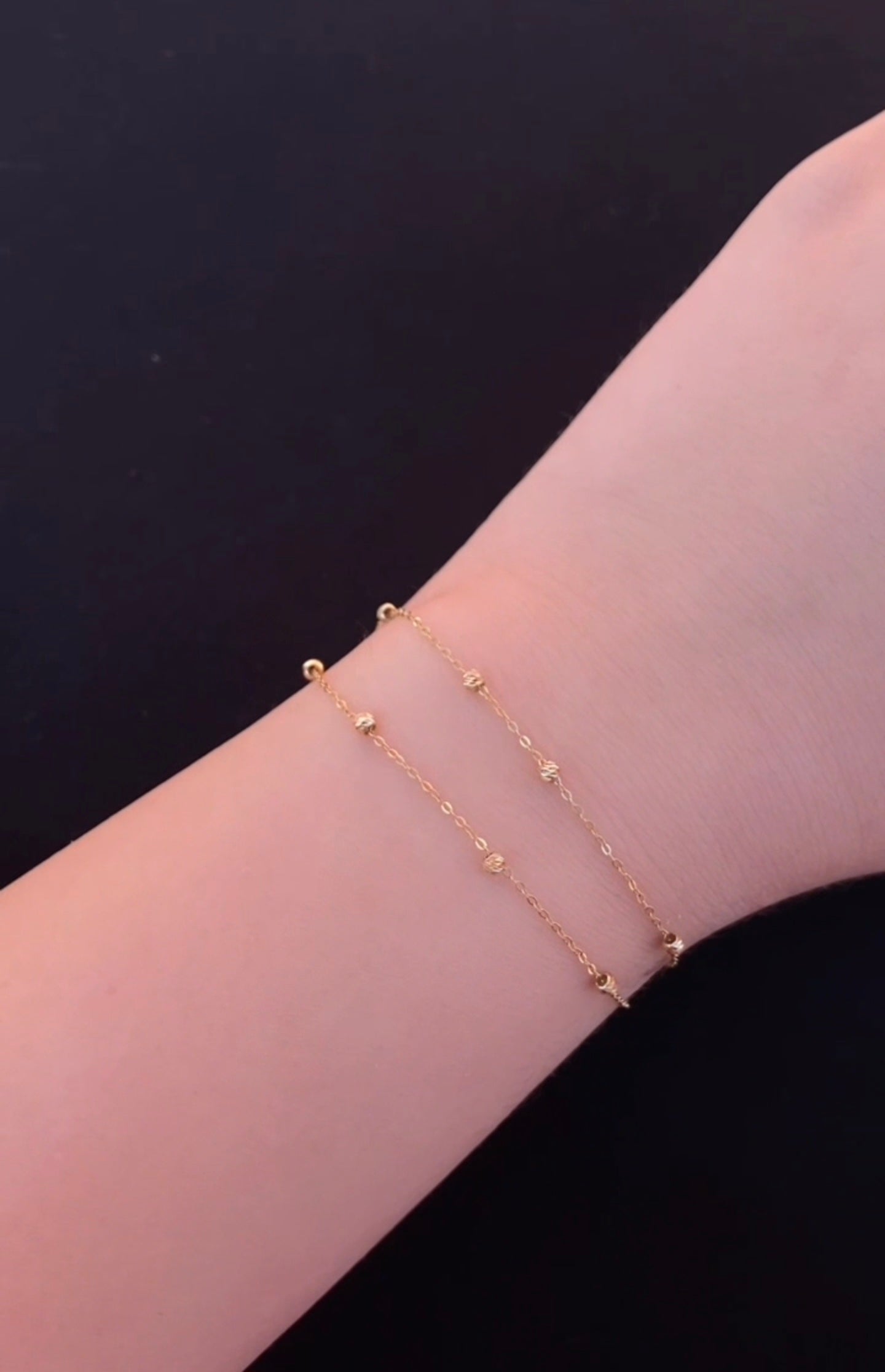 Gourmette Double Boules  en or 18 carats